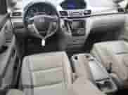 2014 Honda Odyssey Touring with VIN 5FNRL5H9XEB119858, listed as a Copart auction lot 89615605 with 185,453 mi miles and Salvage title. Bid and sale history available at DreamBid. Image 8.