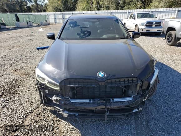 2022 BMW 7 Series 750i xDrive with VIN WBA7U2C05NCH77127, listed as a Copart auction lot 83849074 with 35,079 mi miles and Salvage title. Bid and sale history available at DreamBid. Image 5.