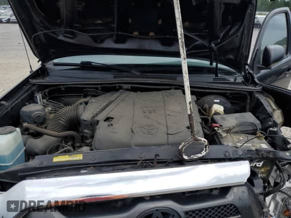 2015 Toyota Tacoma with VIN 3TMLU4EN3FM191805, listed as a Copart auction lot 65480565 with 145,418 mi miles and Salvage title. Bid and sale history available at DreamBid. Image 11.