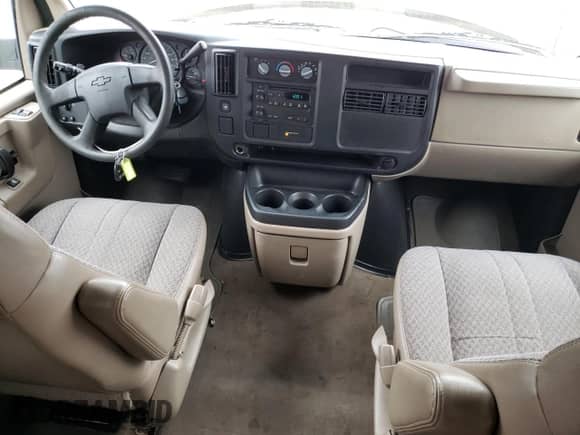 2006 Chevrolet Express Passenger z VIN 1GNFG15T961223498, wystawiony jako Copart lot #45679095 z przebiegiem 191 266 mil mil oraz Szkoda całkowita • Salvage title. Historia ofert i sprzedaży dostępna na DreamBid. Obrazek 8.