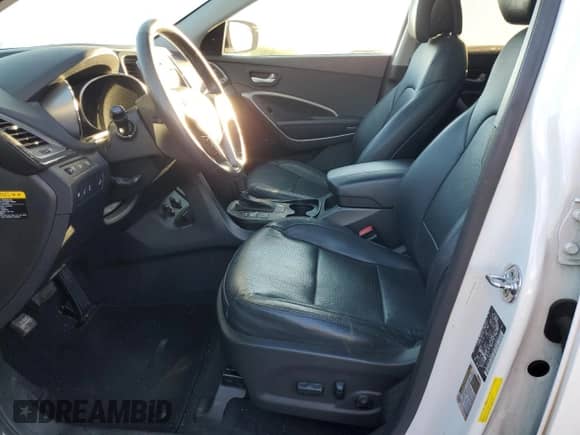 2015 Hyundai Santa Fe с VIN 5XYZWDLA2FG293470, выставлен на аукционе Copart как лот 87119555 с пробегом 168 704 миль миль и Списание • Salvage title. История ставок и продаж доступна на DreamBid. Изображение 7.