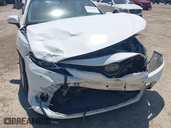 2018 Toyota Camry SE z VIN 4T1B11HK0JU023012, wystawiony jako IAAI lot #43142534 z przebiegiem 122 170 mil mil oraz . Historia ofert i sprzedaży dostępna na DreamBid. Obrazek 6.