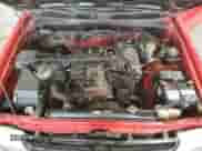 1997 Toyota Tacoma z VIN 4TAVL52N6VZ291508, wystawiony jako Copart lot #82747565 z przebiegiem 233 670 mil mil oraz Szkoda całkowita • Salvage title. Historia ofert i sprzedaży dostępna na DreamBid. Obrazek 11.