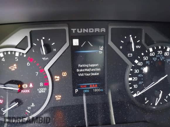 2025 Toyota Tundra SR with VIN 5TFLA5DB9SX319619, listed as a IAAI auction lot 43321211 with 1,800 mi miles and . Bid and sale history available at DreamBid. Image 5.