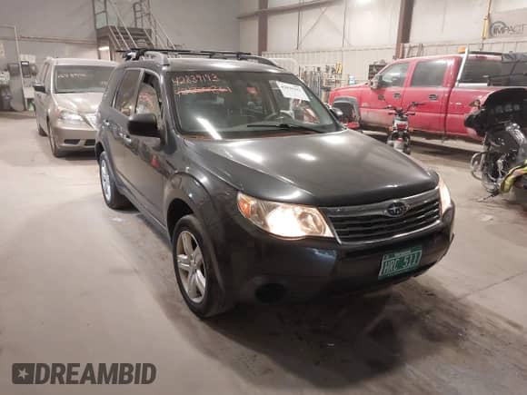 2009 Subaru Forester X z VIN JF2SH63639G784250, wystawiony jako IAAI lot #42839193 z przebiegiem 156 326 mil mil oraz . Historia ofert i sprzedaży dostępna na DreamBid. Obrazek 1.