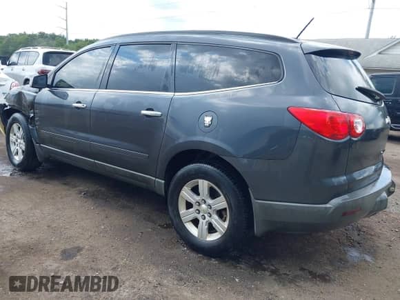 2012 Chevrolet Traverse 1LT with VIN 1GNKRGED6CJ272481, listed as a IAAI auction lot 42974802 with 145,349 mi miles and . Bid and sale history available at DreamBid. Image 3.