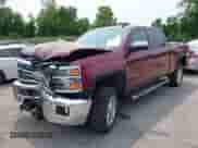 2015 Chevrolet Silverado 2500HD LT z VIN 1GC1KVE83FF102831, wystawiony jako IAAI lot #42411608 z przebiegiem 140 538 mil mil oraz . Historia ofert i sprzedaży dostępna na DreamBid. Obrazek 2.