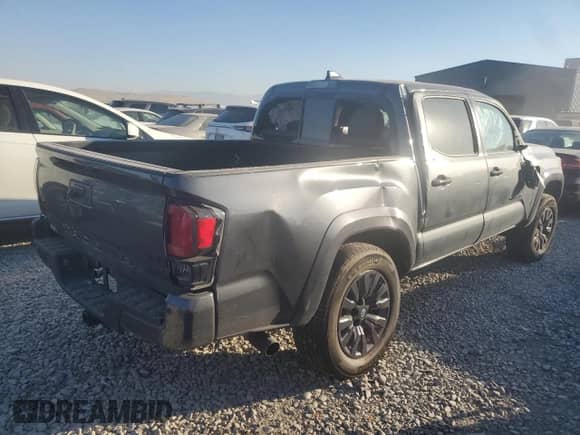 2021 Toyota Tacoma Limited with VIN 3TMGZ5AN1MM427010, listed as a Copart auction lot 74992014 with Not provided miles and Salvage title. Bid and sale history available at DreamBid. Image 3.