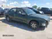 2001 Hyundai Sonata GLS z VIN KMHWF35V11A485934, wystawiony jako Copart lot #69853585 z przebiegiem 120 924 mil mil oraz Szkoda całkowita • Salvage title. Historia ofert i sprzedaży dostępna na DreamBid. Obrazek 4.