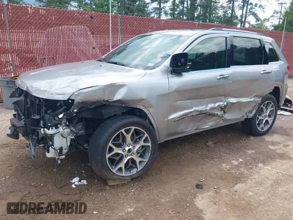 2020 Jeep Grand Cherokee High Altitude with VIN 1C4RJECG2LC140077, listed as a IAAI auction lot 42240760 with 41,933 mi miles and . Bid and sale history available at DreamBid. Image 2.