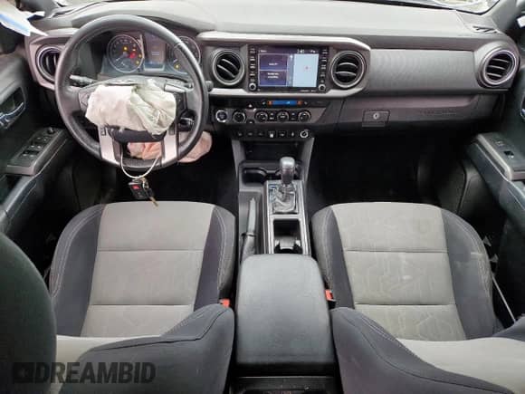 2020 Toyota Tacoma SR5 с VIN 5TFCZ5AN8LX222808, выставлен на аукционе Copart как лот 70812695 с пробегом 97 872 миль миль и Списание • Salvage title. История ставок и продаж доступна на DreamBid. Изображение 8.