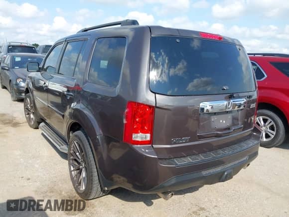 2013 Honda Pilot EX-L with VIN 5FNYF3H54DB024750, listed as a IAAI auction lot 43156830 with 107,550 mi miles and . Bid and sale history available at DreamBid. Image 3.