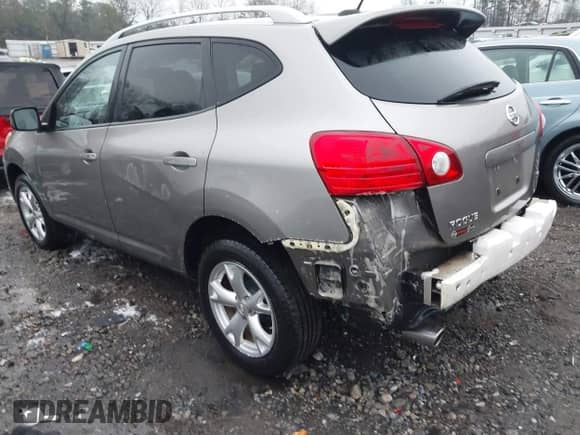 2009 Nissan Rogue S with VIN JN8AS58T29W042534, listed as a IAAI auction lot 41379141 with 229,932 mi miles and . Bid and sale history available at DreamBid. Image 3.