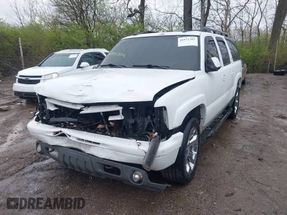 2005 Chevrolet Suburban Z71 z VIN 3GNFK16Z45G127697, wystawiony jako IAAI lot #41971382 z przebiegiem 270 655 mil mil oraz . Historia ofert i sprzedaży dostępna na DreamBid. Obrazek 2.