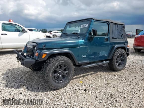 1999 Jeep Wrangler Sport with VIN 1J4FY19S7XP435204, listed as a Copart auction lot 83820835 with 263,738 mi miles and Clean title. Bid and sale history available at DreamBid. Image 1.
