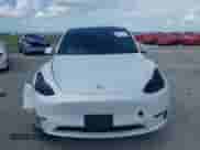 2022 Tesla Model Y Long Range z VIN 7SAYGDEE1NF385915, wystawiony jako IAAI lot #42458295 z przebiegiem 68 345 mil mil oraz . Historia ofert i sprzedaży dostępna na DreamBid. Obrazek 12.