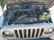 2002 Jeep Wrangler X with VIN 1J4FA39S02P750998, listed as a Copart auction lot 66619075 with 98,985 mi miles and Clean title. Bid and sale history available at DreamBid. Image 12.