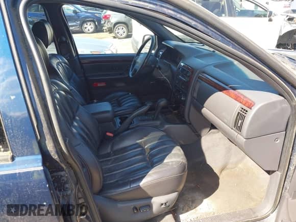 2000 Jeep Grand Cherokee Limited with VIN 1J4GW58N4YC325524, listed as a IAAI auction lot 43245506 with 128,565 mi miles and . Bid and sale history available at DreamBid. Image 5.