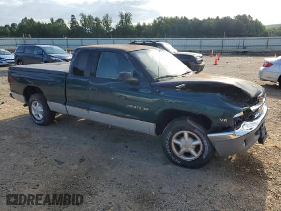 1997 Dodge Dakota с VIN 1B7GL23X4VS204175, выставлен на аукционе Copart как лот 65216755 с пробегом Не указан миль и Списание • Salvage title. История ставок и продаж доступна на DreamBid. Изображение 4.