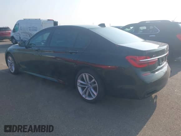 2017 BMW 7 Series ALPINA B7 xDrive with VIN WBA7F2C55HG421227, listed as a IAAI auction lot 42811801 with 96,969 mi miles and . Bid and sale history available at DreamBid. Image 3.