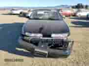 1996 Saturn SL with VIN 1G8ZK527XTZ335205, listed as a Copart auction lot 42230735 with 82,344 mi miles and Salvage title. Bid and sale history available at DreamBid. Image 5.