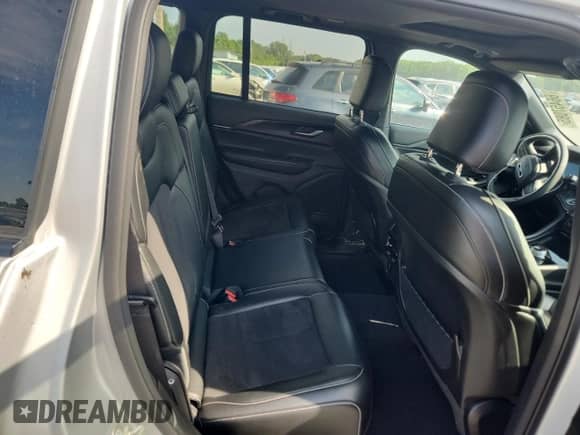 2023 Jeep Grand Cherokee Altitude with VIN 1C4RJHAG3PC661867, listed as a Copart auction lot 66457085 with 26,838 mi miles and Salvage title. Bid and sale history available at DreamBid. Image 11.