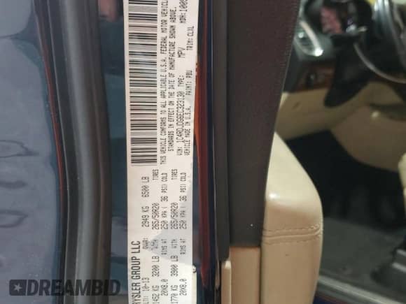 2014 Dodge Durango Limited z VIN 1C4RDJDG6EC323130, wystawiony jako Copart lot #67463715 z przebiegiem 188 734 mil mil oraz Szkoda całkowita • Salvage title. Historia ofert i sprzedaży dostępna na DreamBid. Obrazek 14.