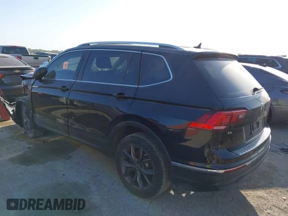 2022 Volkswagen Tiguan SE with VIN 3VV3B7AX7NM161706, listed as a IAAI auction lot 42869878 with Not provided miles and . Bid and sale history available at DreamBid. Image 3.