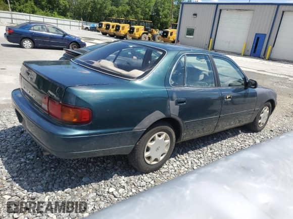 1996 Toyota Camry DX z VIN 4T1BG12K5TU651447, wystawiony jako Copart lot #67166645 z przebiegiem 155 612 mil mil oraz Czysty tytuł • Clean title. Historia ofert i sprzedaży dostępna na DreamBid. Obrazek 3.