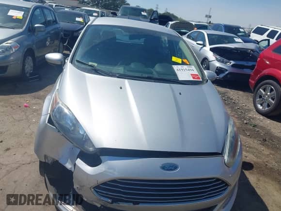 2014 Ford Fiesta S with VIN 3FADP4TJ5EM199405, listed as a IAAI auction lot 41915494 with 127,474 mi miles and . Bid and sale history available at DreamBid. Image 12.