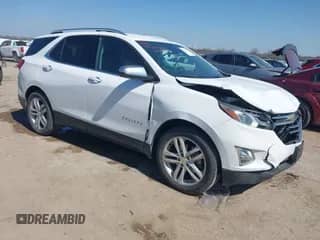 2020 Chevrolet Equinox Premier with VIN 2GNAXPEX9L6234221, listed as a IAAI auction lot 41674121 with 103,838 mi miles and . Bid and sale history available at DreamBid. Image 1.