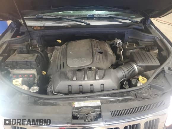 2013 Jeep Grand Cherokee Limited с VIN 1C4RJFBT2DC573453, выставлен на аукционе Copart как лот 69090345 с пробегом 109 738 миль миль и Списание • Salvage title. История ставок и продаж доступна на DreamBid. Изображение 11.