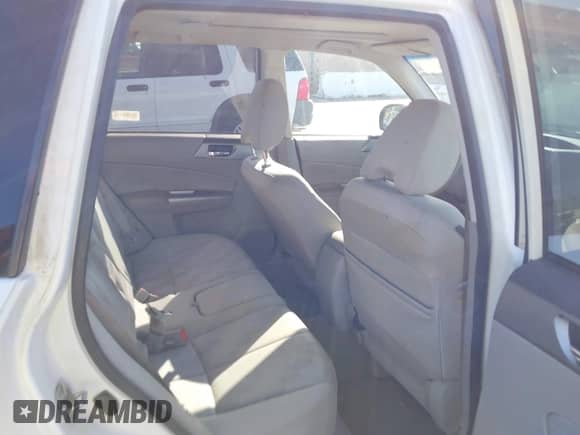 2009 Subaru Forester X with VIN JF2SH63619H758501, listed as a IAAI auction lot 42303581 with 207,078 mi miles and . Bid and sale history available at DreamBid. Image 8.