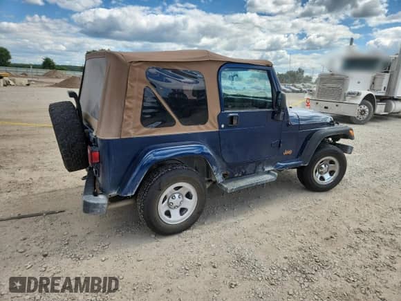 2003 Jeep Wrangler X z VIN 1J4FA39S33P356428, wystawiony jako Copart lot #70285135 z przebiegiem 147 788 mil mil oraz Szkoda całkowita • Salvage title. Historia ofert i sprzedaży dostępna na DreamBid. Obrazek 3.