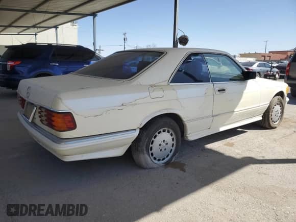 1983 Mercedes-Benz 500 с VIN WDB12604412006680, выставлен на аукционе Copart как лот 51018595 с пробегом 105 263 миль миль и Чистый • Clean title. История ставок и продаж доступна на DreamBid. Изображение 3.