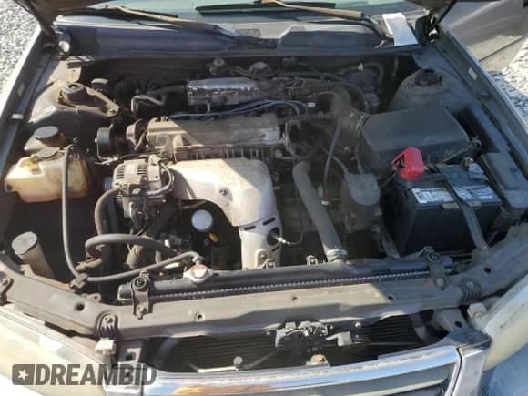 2001 Toyota Camry LE z VIN 4T1BG22K81U020369, wystawiony jako Copart lot #83791885 z przebiegiem 209 821 mil mil oraz Szkoda całkowita • Salvage title. Historia ofert i sprzedaży dostępna na DreamBid. Obrazek 11.