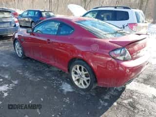 2007 Hyundai Tiburon GT с VIN KMHHN66F57U250724, выставлен на аукционе IAAI как лот 41443804 с пробегом 142 460 миль миль и . История ставок и продаж доступна на DreamBid. Изображение 3.