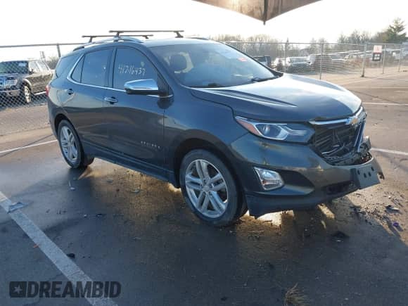 2018 Chevrolet Equinox Premier with VIN 2GNAXWEX7J6139051, listed as a IAAI auction lot 41216437 with 105,453 mi miles and . Bid and sale history available at DreamBid. Image 1.