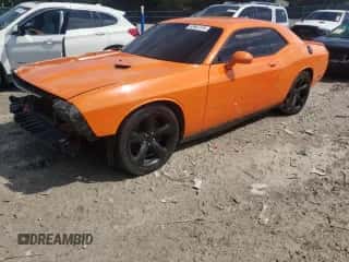 2014 Dodge Challenger R/T with VIN 2C3CDYBTXEH184958, listed as a Copart auction lot 83867315 with 91,228 mi miles and Salvage title. Bid and sale history available at DreamBid. Image 1.
