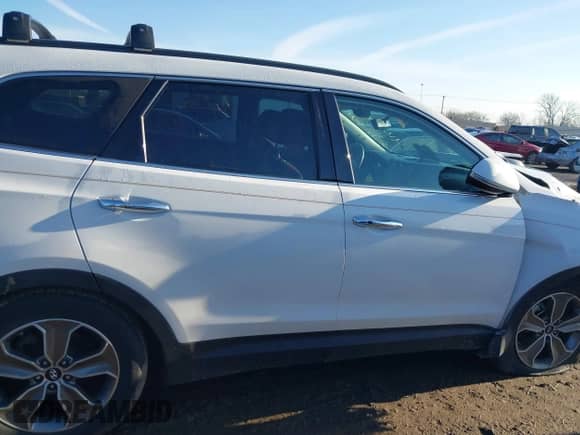 2014 Hyundai Santa Fe Limited с VIN KM8SNDHF3EU039574, выставлен на аукционе IAAI как лот 41689001 с пробегом 162 105 миль миль и . История ставок и продаж доступна на DreamBid. Изображение 14.