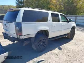 2007 Chevrolet Suburban LT with VIN 1GNFK16327J207447, listed as a IAAI auction lot 43413942 with 244,947 mi miles and . Bid and sale history available at DreamBid. Image 4.