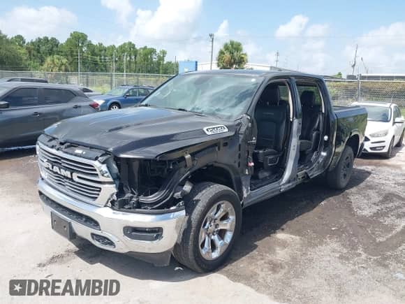 2019 Ram 1500 Laramie with VIN 1C6RREJT3KN771472, listed as a IAAI auction lot 42833281 with 60,860 mi miles and . Bid and sale history available at DreamBid. Image 21.