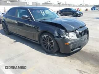 2006 Chrysler 300 C SRT-8 with VIN 2C3LA73W86H518966, listed as a IAAI auction lot 42725107 with 175,474 mi miles and . Bid and sale history available at DreamBid. Image 1.