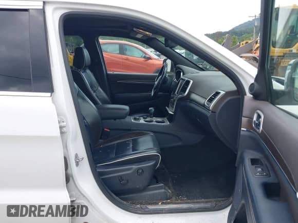 2015 Jeep Grand Cherokee High Altitude z VIN 1C4RJFCM5FC714493, wystawiony jako IAAI lot #42886915 z przebiegiem 180 687 mil mil oraz . Historia ofert i sprzedaży dostępna na DreamBid. Obrazek 5.