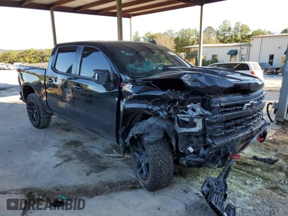 2023 Chevrolet Silverado 1500 LT Trail Boss with VIN 3GCUDFED1PG244640, listed as a Copart auction lot 87000205 with 52,000 mi miles and Salvage title. Bid and sale history available at DreamBid. Image 4.