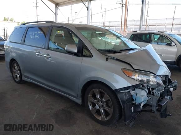 2014 Toyota Sienna SE with VIN 5TDXK3DC8ES485443, listed as a IAAI auction lot 42685176 with 91,853 mi miles and . Bid and sale history available at DreamBid. Image 1.