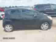 2013 Chevrolet Spark LT z VIN KL8CD6S95DC607864, wystawiony jako IAAI lot #42618384 z przebiegiem 145 617 mil mil oraz . Historia ofert i sprzedaży dostępna na DreamBid. Obrazek 14.