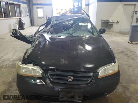 1999 Honda Accord EX with VIN 1HGCG3272XA026660, listed as a Copart auction lot 56629585 with 180,716 mi miles and Salvage title. Bid and sale history available at DreamBid. Image 5.