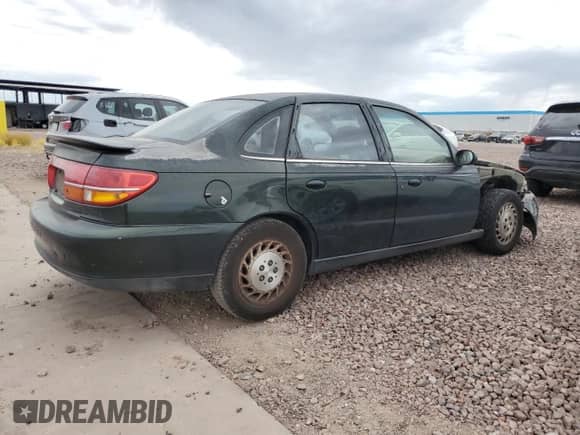 2000 Saturn LS with VIN 1G8JU52F1YY683714, listed as a Copart auction lot 69346334 with 231,845 mi miles and Salvage title. Bid and sale history available at DreamBid. Image 3.