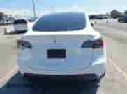2023 Tesla Model Y Long Range z VIN 7SAYGDEE9PA081036, wystawiony jako IAAI lot #43151161 z przebiegiem 49 637 mil mil oraz . Historia ofert i sprzedaży dostępna na DreamBid. Obrazek 16.